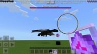 Ender Dragon fight (Image via YouTube & Minecraft)